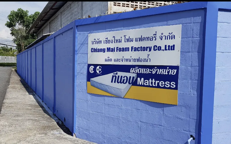 Chiang Mai Foam Factory mattress sign on a wall, Chiang Mai