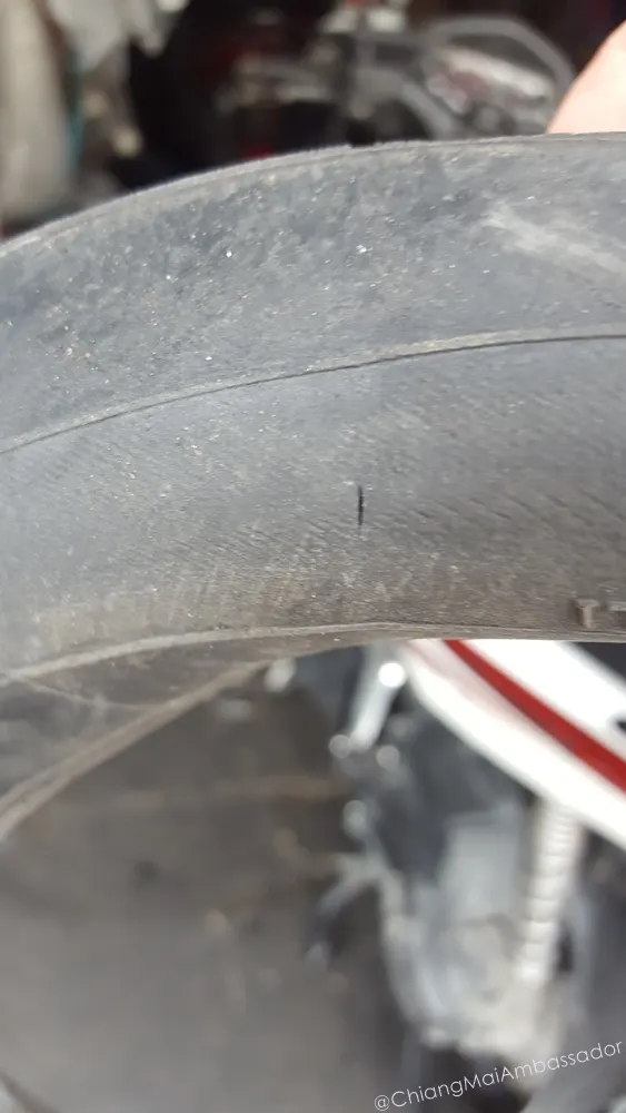 Ba yarng recap tyre repair sign with phone number