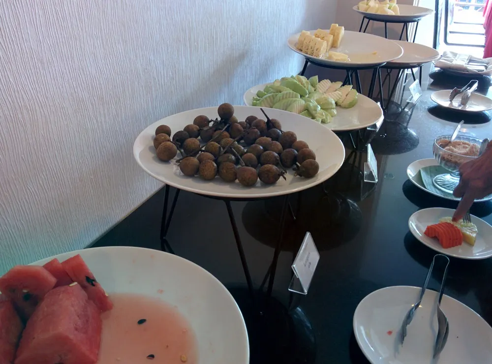 Fresh seasonal fruit plates at the buffet