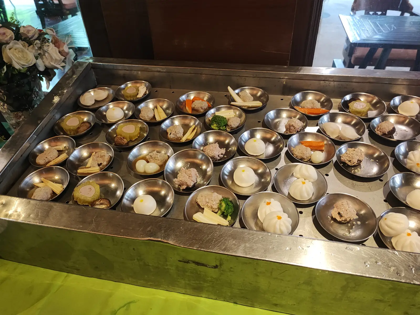 Dim sum selection including dumplings and siu mai