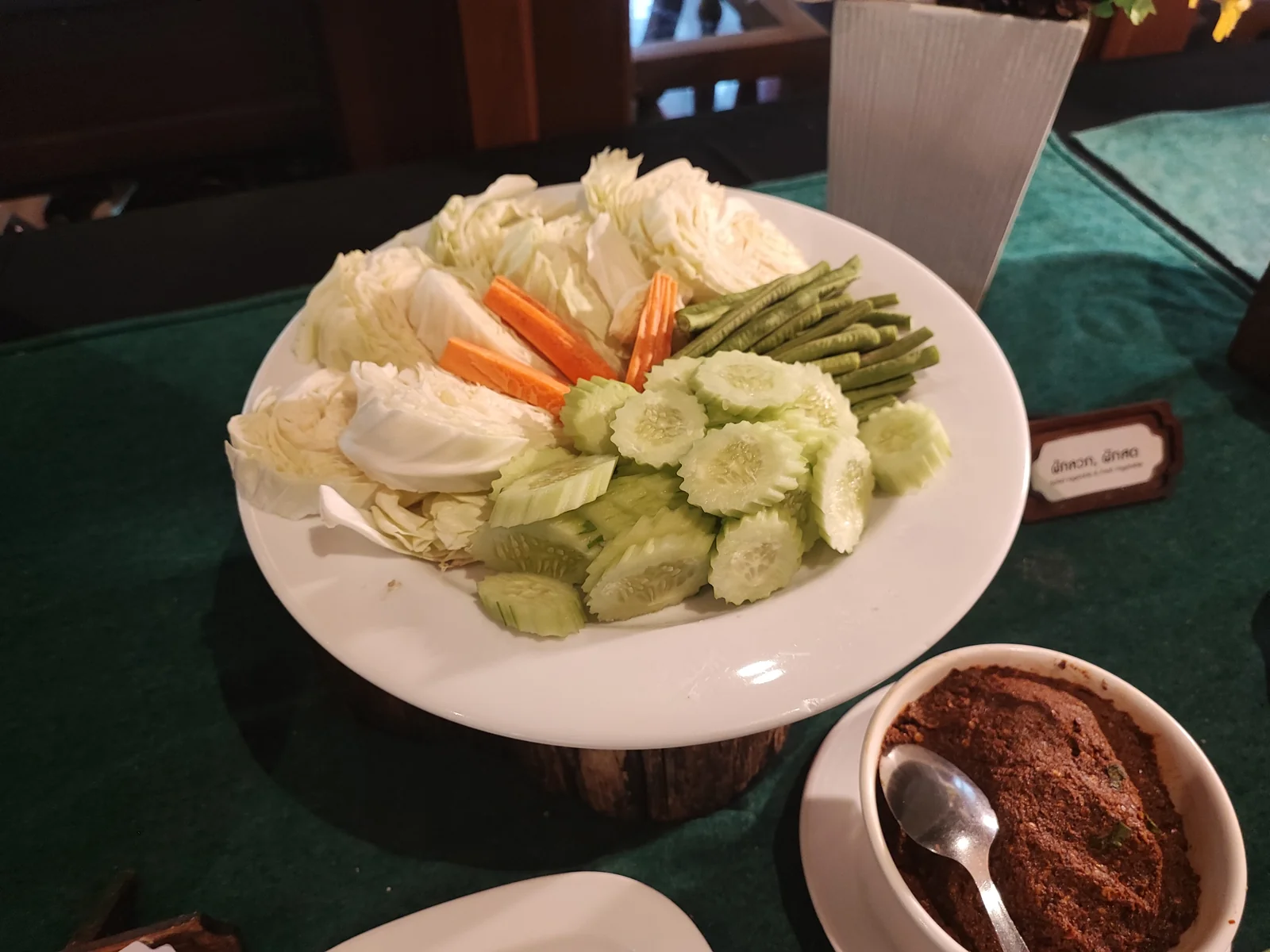 Cabbage, carrot and cucumber platter with chili dips