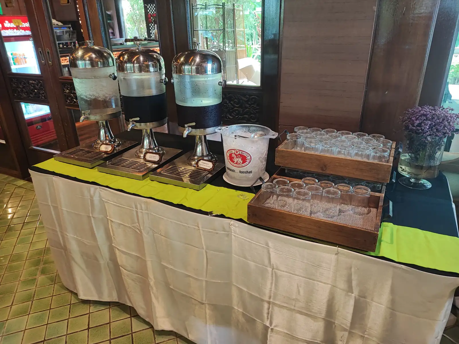 Drink station with juice dispensers and glassware