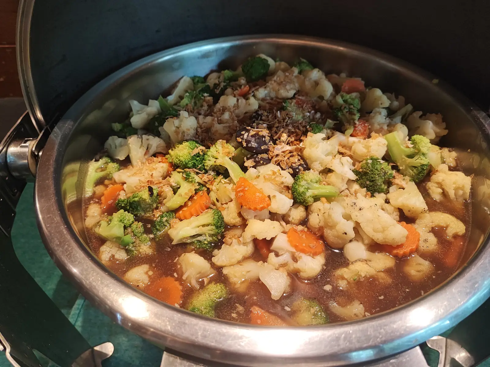 Mixed vegetable curry in the buffet chafing dish