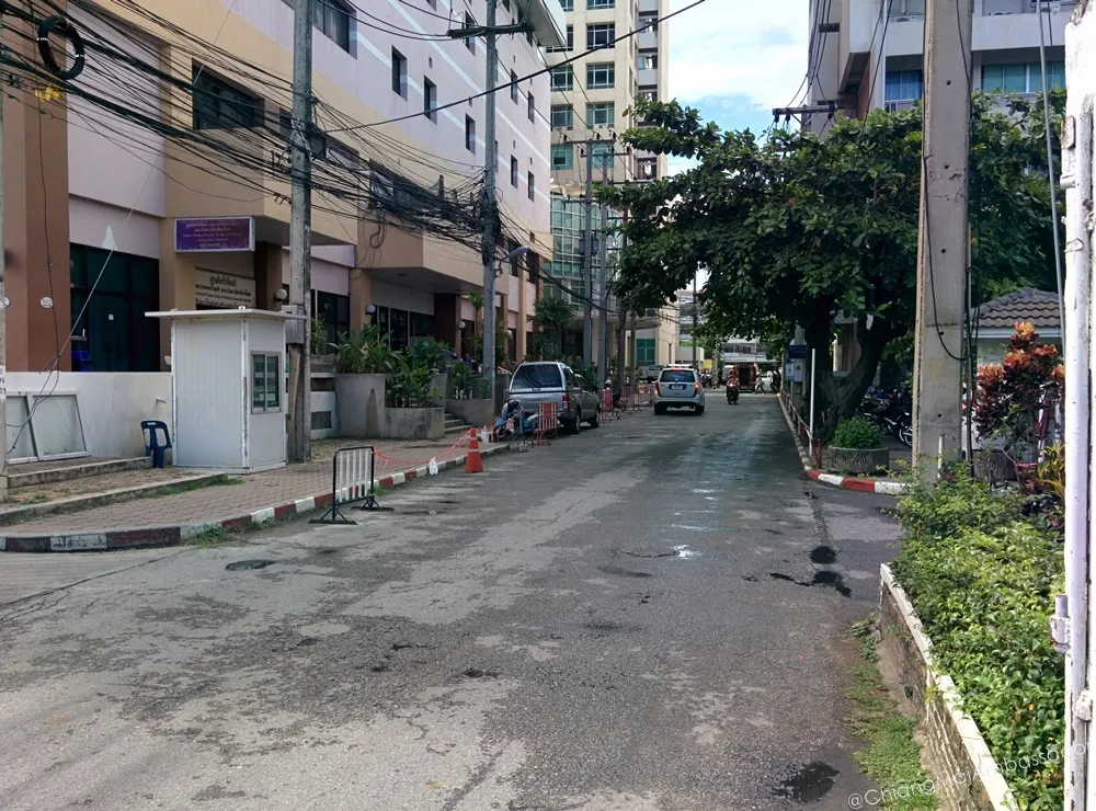 Street outside the hospital with a security guard booth