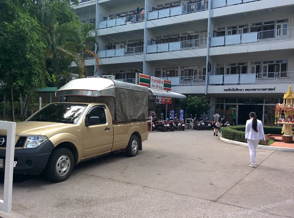 Street view of the Suan Dok hospital campus buildings