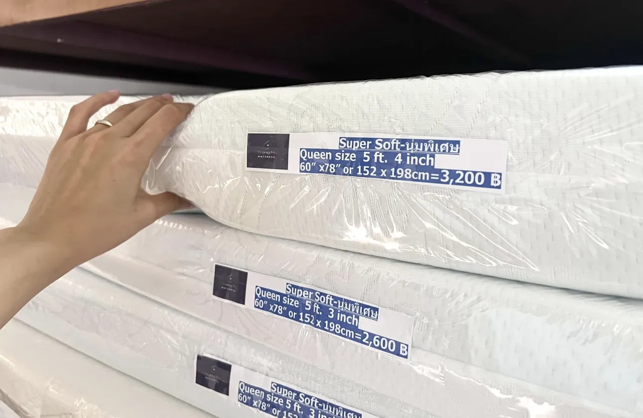 Super Soft mattress pricing labels at a Chiang Mai foam factory